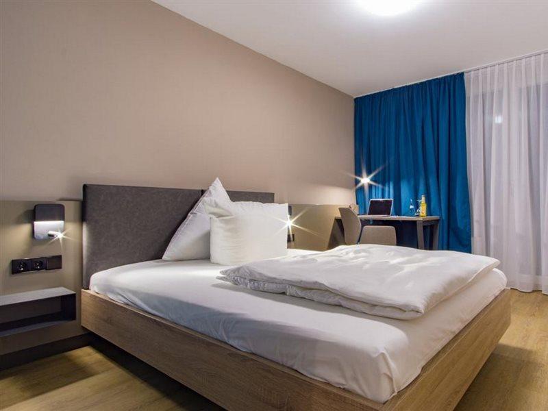 Hotel Berlin ซินเดลฟิงเงน ภายนอก รูปภาพ