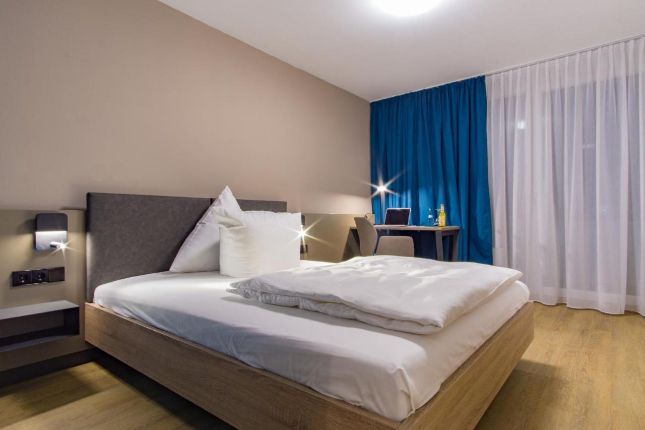 Hotel Berlin ซินเดลฟิงเงน ภายนอก รูปภาพ